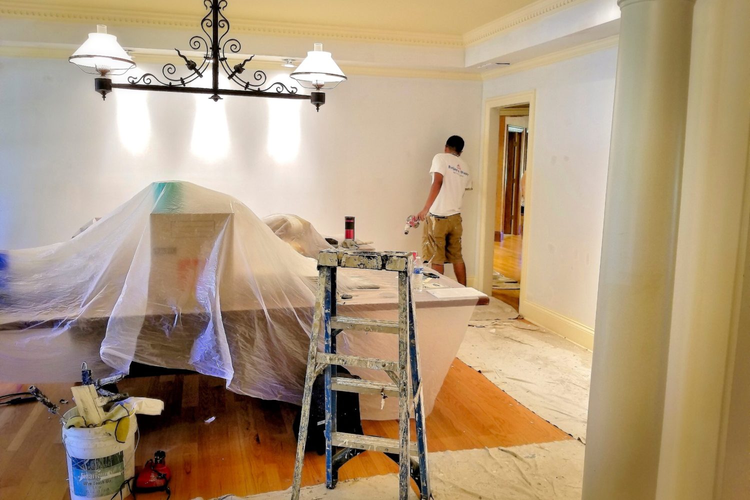 painters-paint-a-room-during-a-remodel-2023-11-27-05-34-44-utc